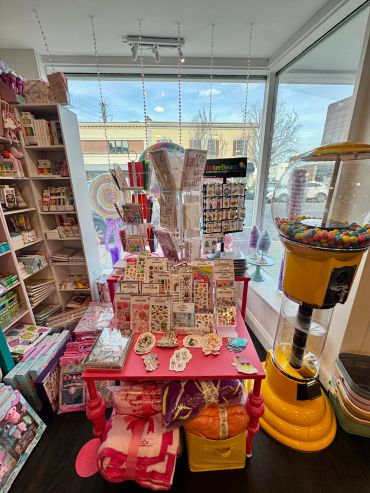 Our sticker and greeting card section. Also can't forget our giant gumball machine!