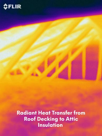 Radiant heat transfer from roof decking to attic insulation shown using thermal imaging