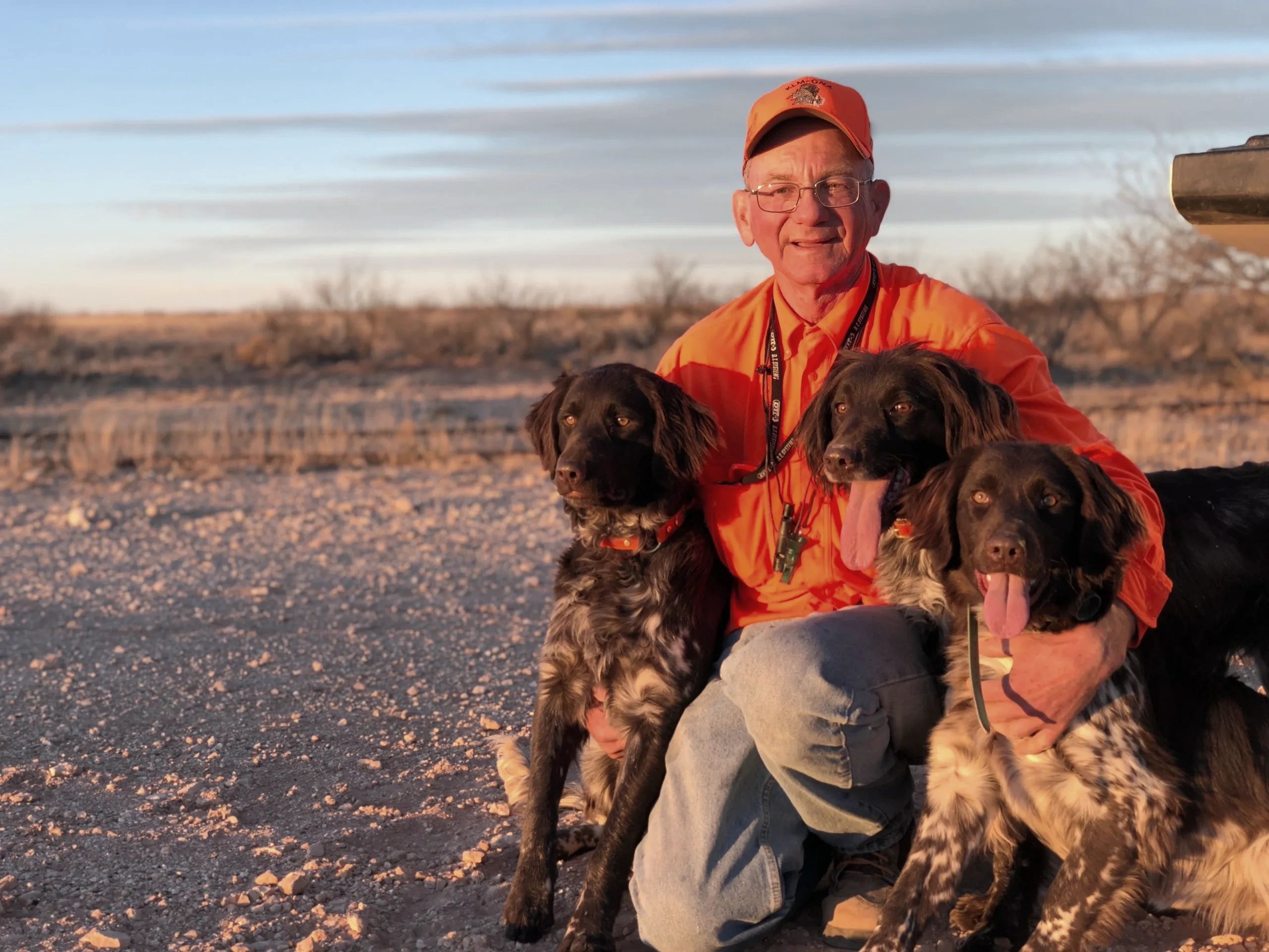 Jim Julson with Kleine/Small Munsterlander dogs.