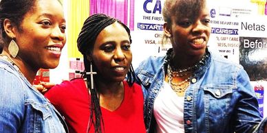 With customers at Atanta natural
Hair show