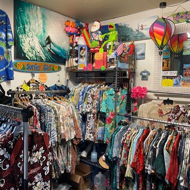 Ukuleles and tropical shirts inside Corner Shops Mall location.