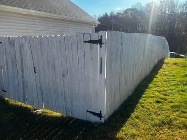 Fence that was painted and needed washing to take paint off