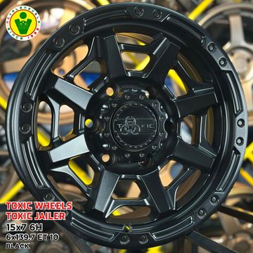 Black 15x7 Toxic Jailor wheel with rugged design.