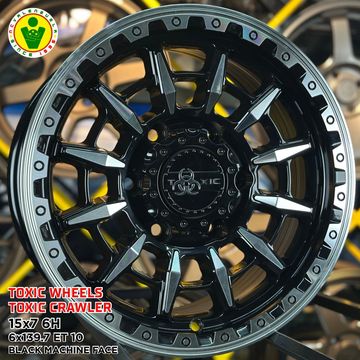 Black and silver Toxic Wheels off-road rim.