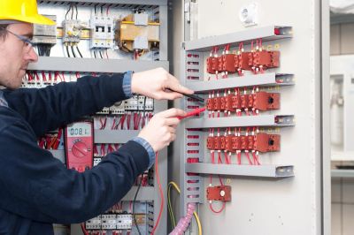 a man fixing the cables