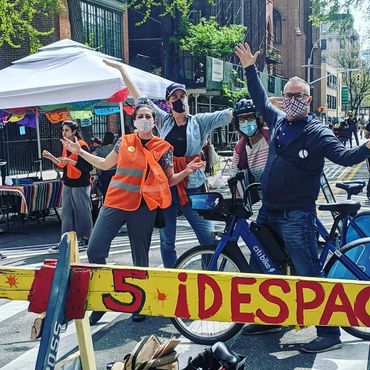 LES streets designated as outdoor space for residents to bike, walk, & hold fitness classes.