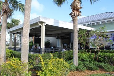 Restaurant with outdoor sports bar patio.