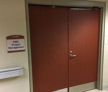 Hollow metal doors wrapped with Belbien architectural film.