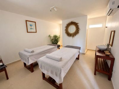 Couples massage room with two treatment beds at Kitam Spa & Massage in Paje, Zanzibar.