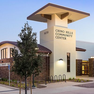 Chino Hills Community Center building with modern architecture at dusk.