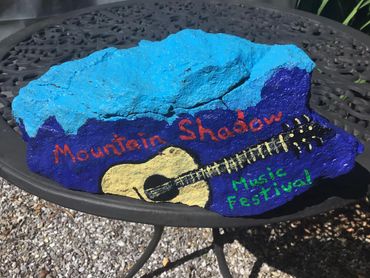 Bob’s daughter painted the “official” festival rock
