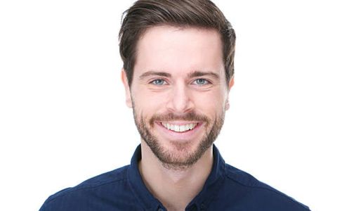 Man with lite beard showing the results of laser hair removal for men.