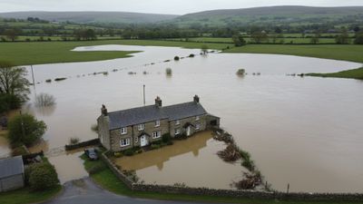 drone images after a river flooded farmland