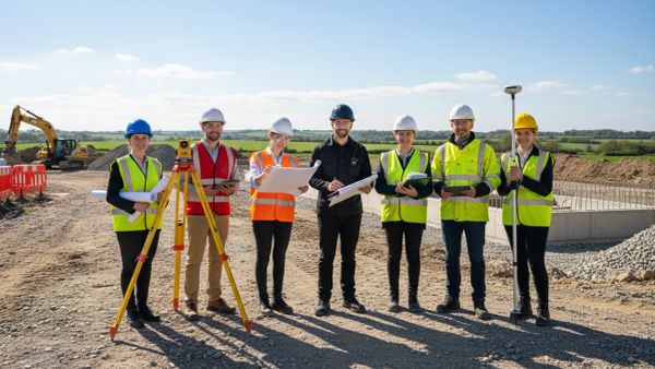image of several professionals involved in land and property management that we serve with our drone