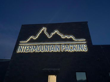 exterior illuminated sign on building