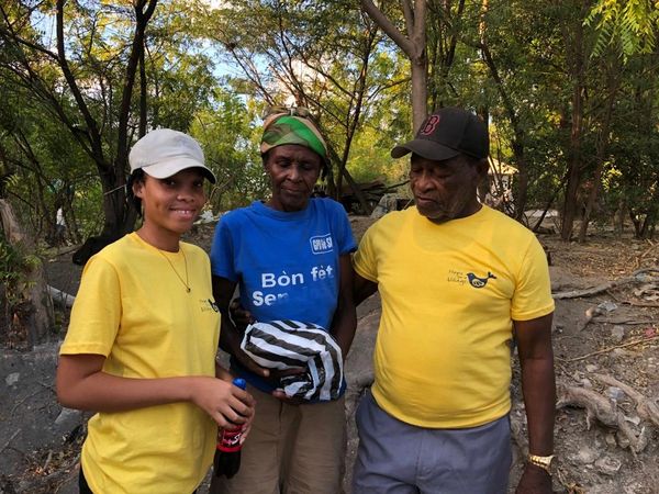 Some members of the team distributing meals to our beneficiaries in the homes!