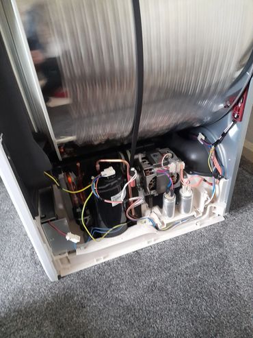 Heat pump tumble dryer