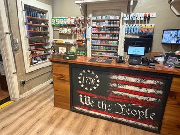 Front counter and retail area inside Mystery Shack Cigars & Coffee in Shallowater, Texas.