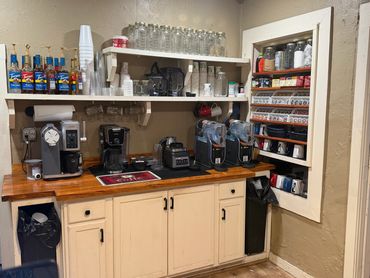 Coffee bar at Mystery Shack Cigars & Coffee featuring hot and cold coffee equipment and drink select