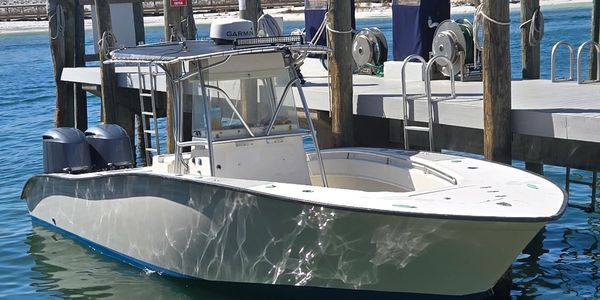 Topping off the tanks on the 31' Cape Horn at the Destin Harborwalk Marina.