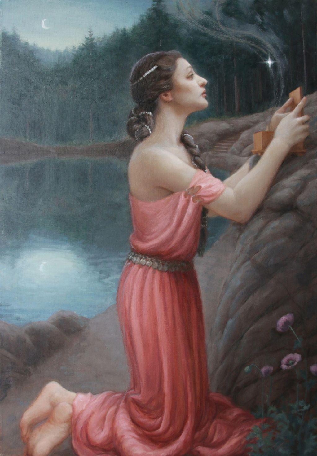 Woman knelt next to lake, holding an open box