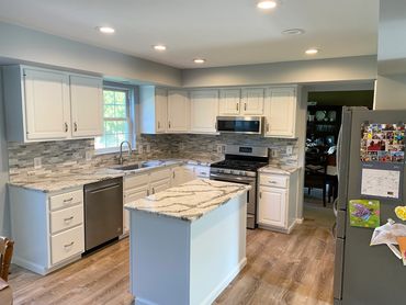 kitchen remodel, painted cabinets, marble-look countertop, tile backsplash, white kitchen island
