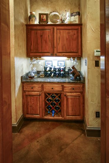 A wine cellar with wooden cupboards