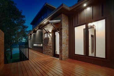 Brick siding with doors, windows, and wooden floors