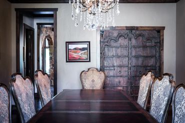 A classic dining room with a chandelier