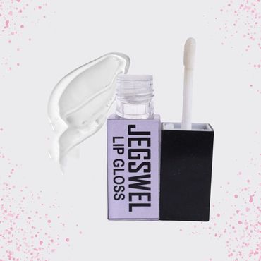 Clear lip gloss with applicator and swatch on white background.