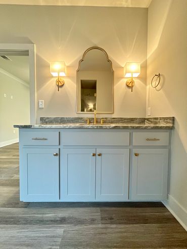 Moody bathroom with custom cabinets