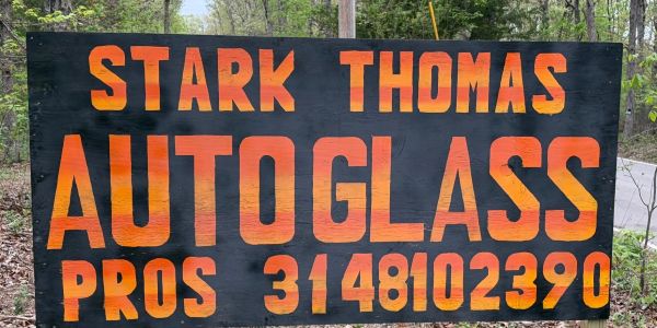 Outdoor sign for Stark Thomas Auto Glass Pros.