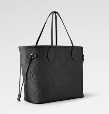 Hermès exotic leather Birkin stored under soft lighting.