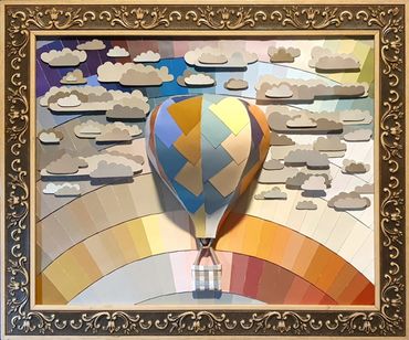 Into the Sunset An arching collage of a colorful sunset with a colorful air balloon