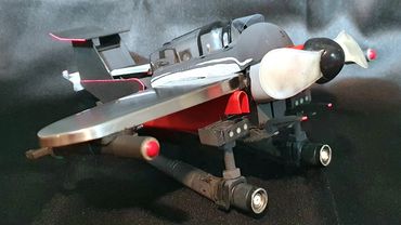 Seaplane Sculpture of plane made entirely out of upcycled metal and plastic parts then painted