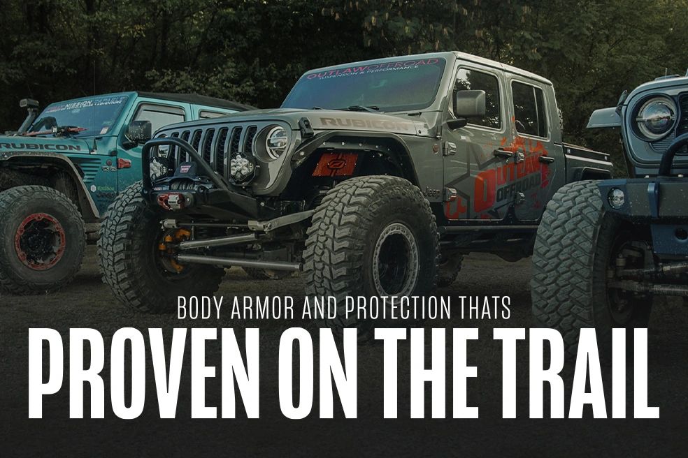 dramatic image showing outlaw offroad jeep gladiaor with motobilt bumpers and fenders