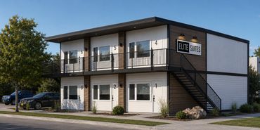 Two-story modern motel building named Elite Suites.