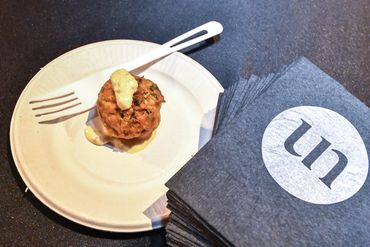 Culinary offerings at an event offered with branded logo napkins.