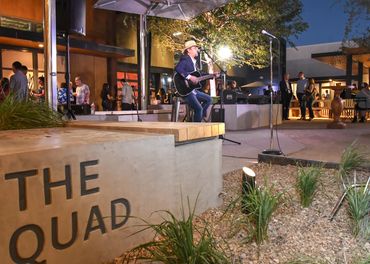 AGT Winner Michael Grimm performs an un-plugged set at a reception.