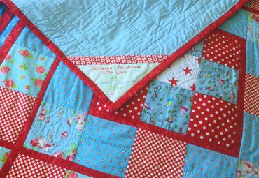 Finished Red and Turquoise Quilt with label - 2020 © Sally Quick