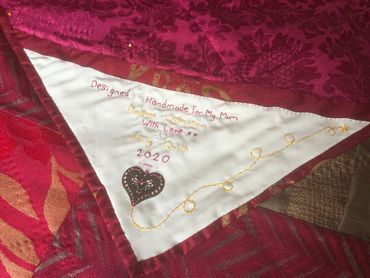 Hand embroidered quilt label © Sally Quick