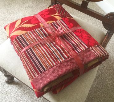 Large red and gold quilt, made from upholstery and heavy weight curtain fabrics © Sally Quick
