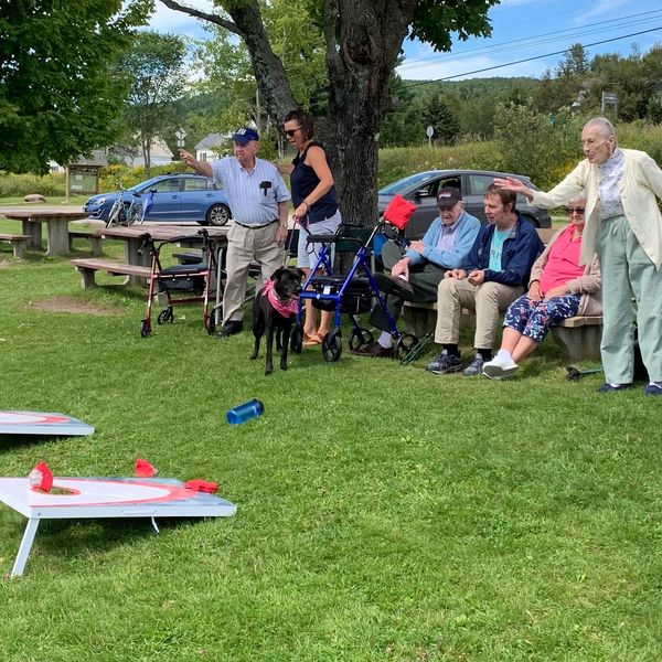 residents playing cornhole