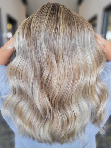 Creamy beige blonde and haircut