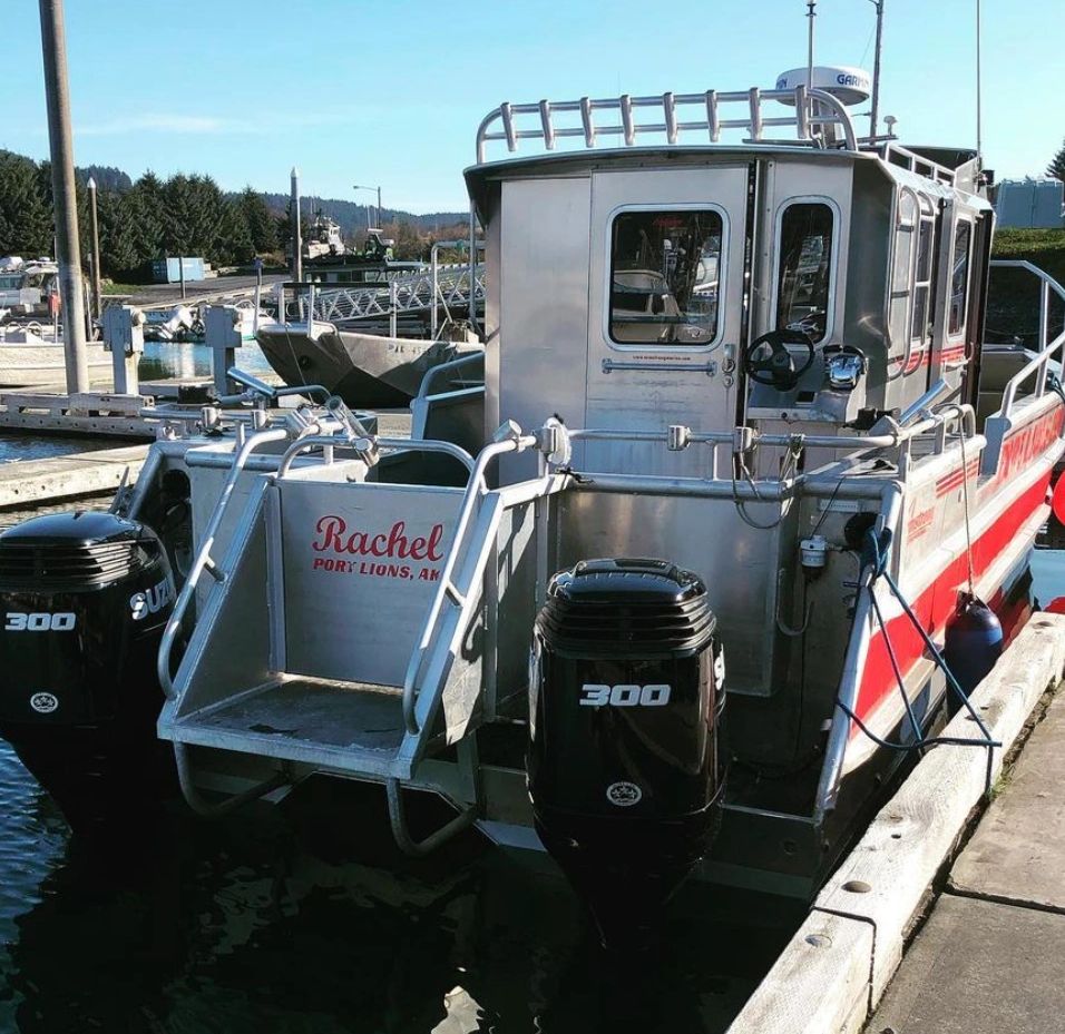 30' Armstrong Catamaran at the harbor showing off the twin 300 suzuki engines