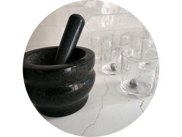 Prepping! Mortar and pestal, glass jars with moon stones