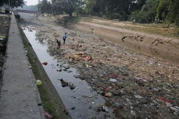 Immersing offerings in these rivers conflicts with efforts to clean and restore them.