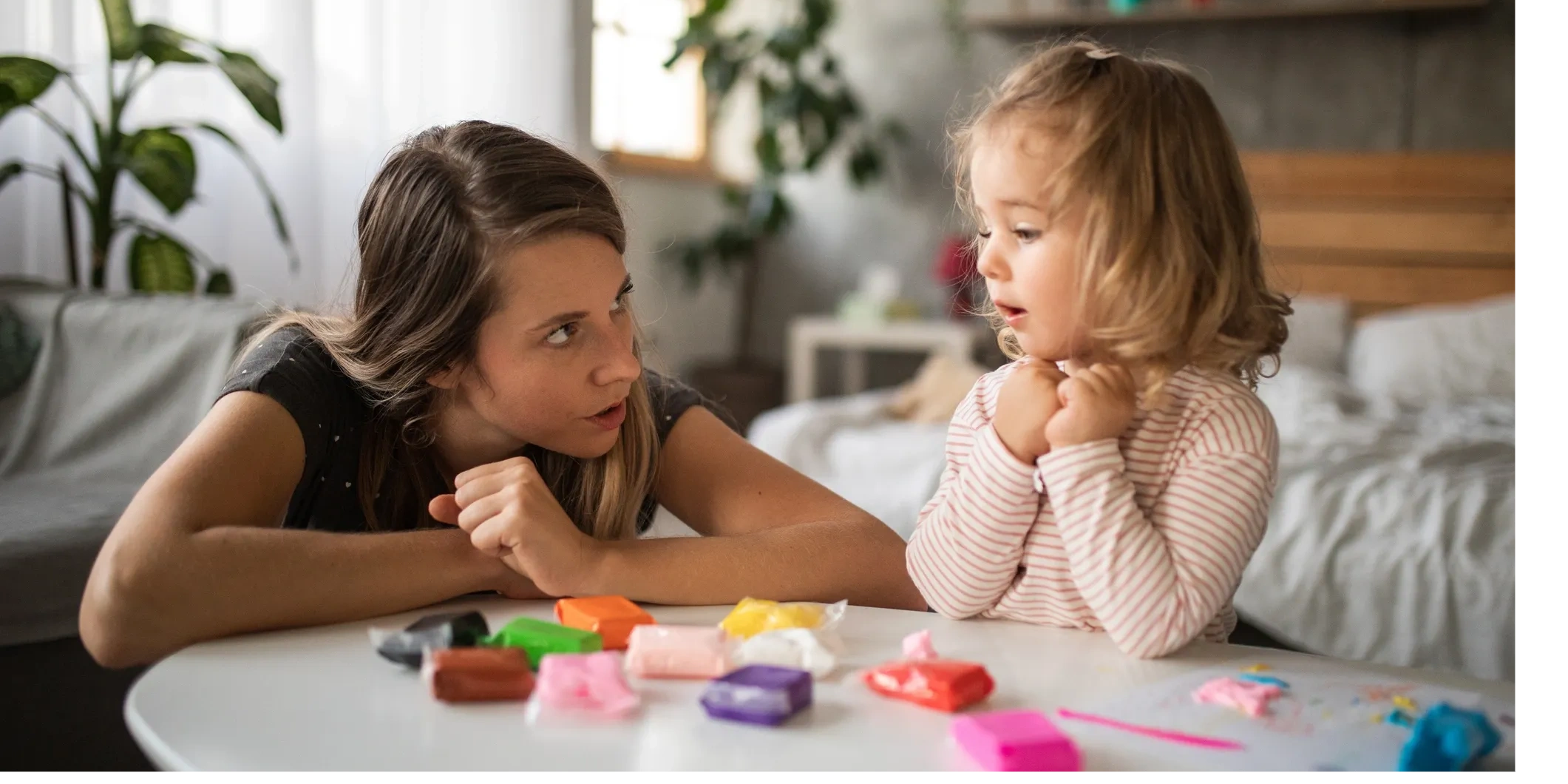 Greater Minnesota Family Services - Image of counselor and child