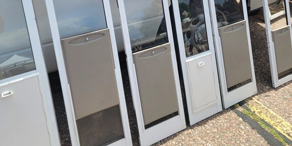 A variety of pet door inserts in Denver
