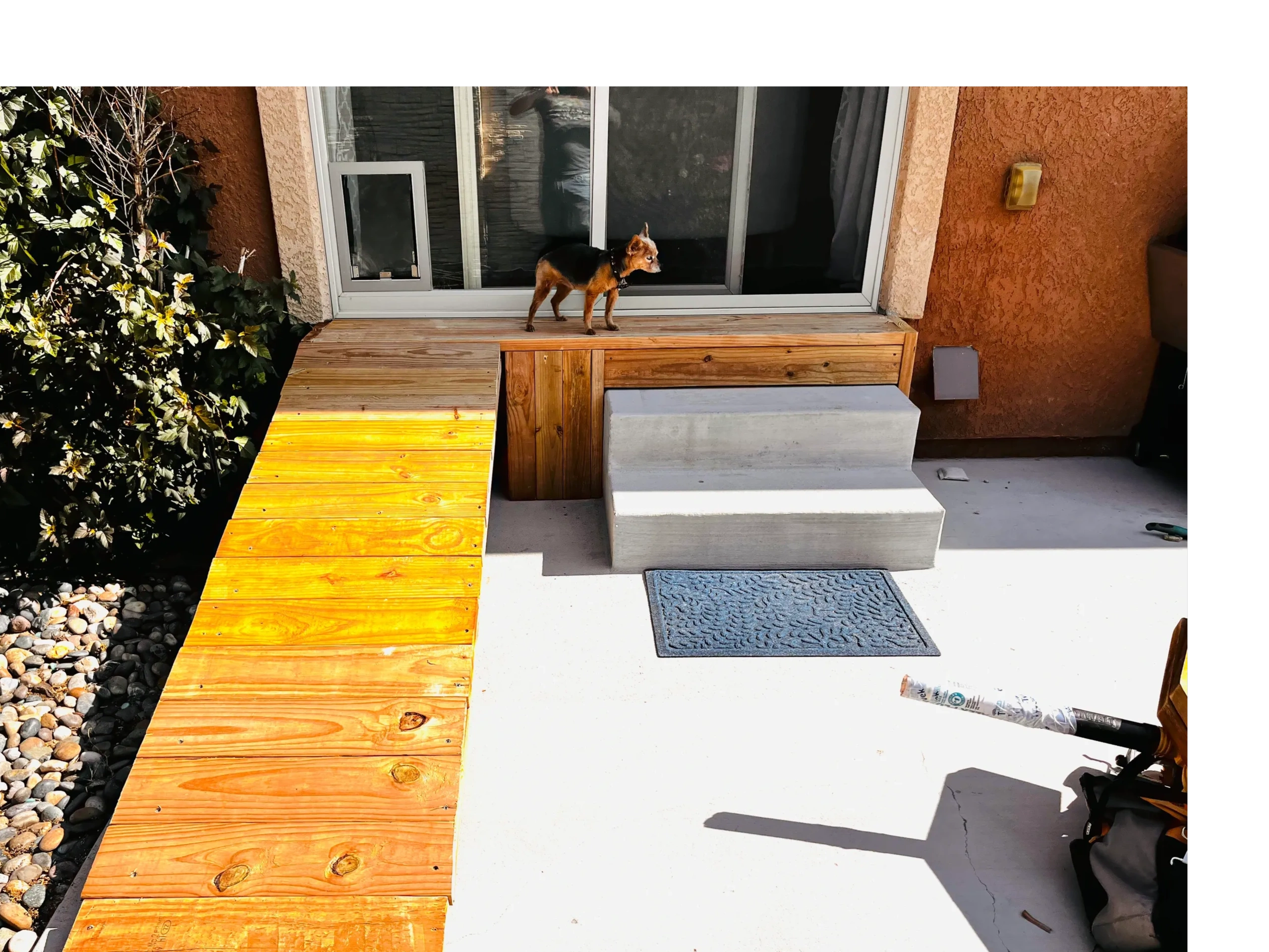 Insulated sliding glass door with a custom-made ramp for an old dog installed in Denver Colorado